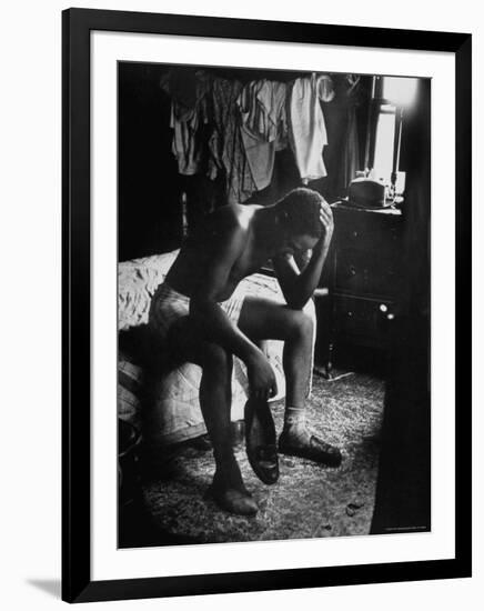 Pensive Portrait of Young African American Alone in His Room from Youth Essay-Gordon Parks-Framed Photographic Print