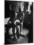 Pensive Portrait of Young African American Alone in His Room from Youth Essay-Gordon Parks-Mounted Photographic Print