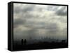 People and a Dog are Silhouetted Against a Landscape of Central London-null-Framed Stretched Canvas