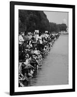 People at Civil Rights Rally Soaking their Feet in the Reflecting Pool at the Washington Monument-John Dominis-Framed Photographic Print