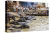 People at Cremation Site, Ganges River, Varanasi, India-Ali Kabas-Stretched Canvas