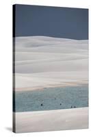People Bathe in One of Brazil's Lencois Maranhenses Lagoons Surrounded by Sand Dunes-Alex Saberi-Stretched Canvas