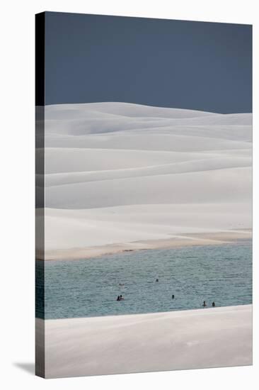 People Bathe in One of Brazil's Lencois Maranhenses Lagoons Surrounded by Sand Dunes-Alex Saberi-Stretched Canvas