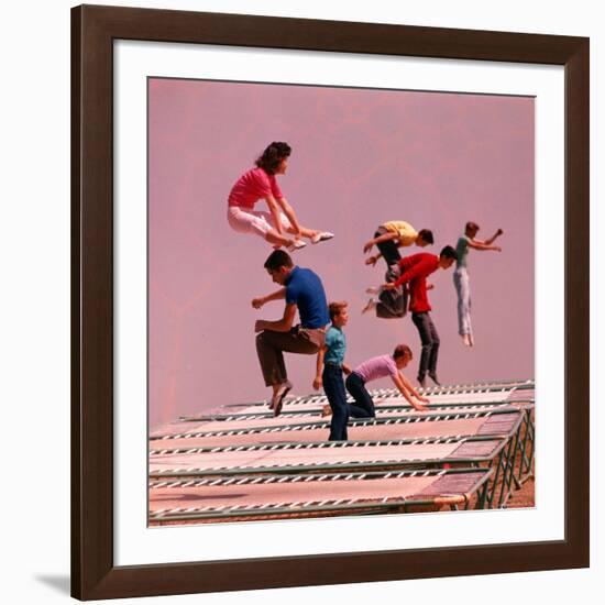 People Bouncing on Trampolines at Trampoline Center-J^ R^ Eyerman-Framed Photographic Print