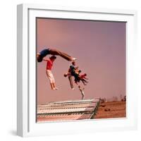 People Bouncing on Trampolines at Trampoline Center-J^ R^ Eyerman-Framed Photographic Print