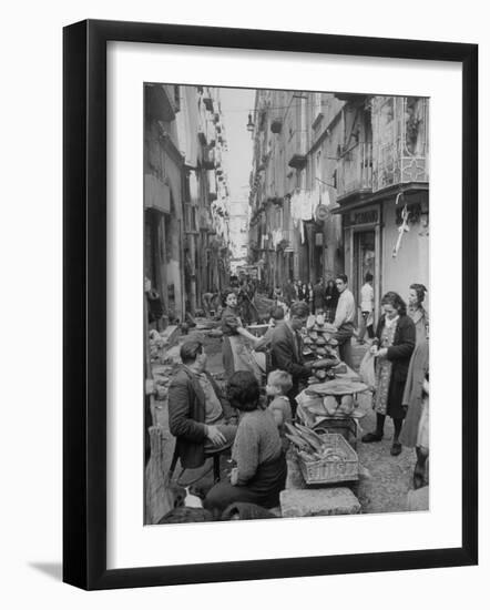 People Buying Bread in the Streets of Naples-Alfred Eisenstaedt-Framed Premium Photographic Print