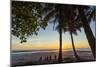 People by Palm Trees at Sunset on Playa Hermosa Beach, Santa Teresa, Costa Rica-Rob Francis-Mounted Photographic Print