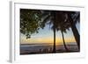 People by Palm Trees at Sunset on Playa Hermosa Beach, Santa Teresa, Costa Rica-Rob Francis-Framed Photographic Print