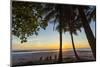 People by Palm Trees at Sunset on Playa Hermosa Beach, Santa Teresa, Costa Rica-Rob Francis-Mounted Photographic Print