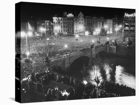 People Celebrating the Independence of Ireland on O'Connell Bridge before Midnight on Easter Sunday-Larry Burrows-Stretched Canvas