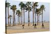 People Cycling the South Bay Cycle Route in the Town of Santa Monica Near Los Angeles-null-Stretched Canvas