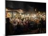 People eating at one of the stalls in Jemaa el-Fna at night, Marrakesh, Morocco-null-Mounted Photographic Print
