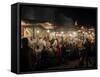 People eating at one of the stalls in Jemaa el-Fna at night, Marrakesh, Morocco-null-Framed Stretched Canvas