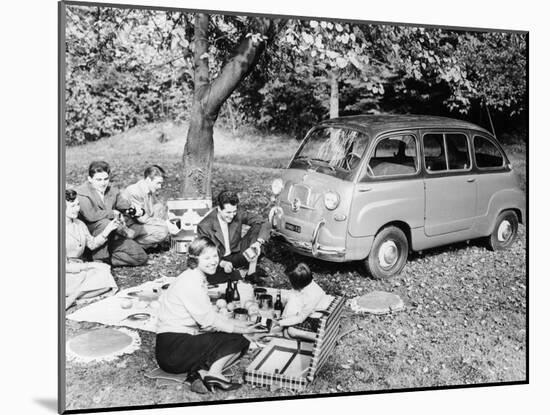 People Enjoying a Picnic Beside a 1956 Fiat 600 Multipla, (C1956)-null-Mounted Photographic Print