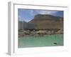 People Floating in the Sea and Hyatt Hotel and Desert Cliffs in Background, Dead Sea, Middle East-Eitan Simanor-Framed Photographic Print