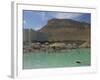 People Floating in the Sea and Hyatt Hotel and Desert Cliffs in Background, Dead Sea, Middle East-Eitan Simanor-Framed Photographic Print