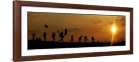 People Fly Kites as They are Silhouetted by the Setting Sun on Hampstead Heath in London-null-Framed Photographic Print