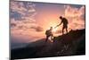 People Helping Each Other Hike up a Mountain at Sunrise. Giving a Helping Hand, and Active Fit Life-null-Mounted Photographic Print