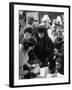 People in a Meat Store Watching Butcher Cut Meat-Yale Joel-Framed Premium Photographic Print