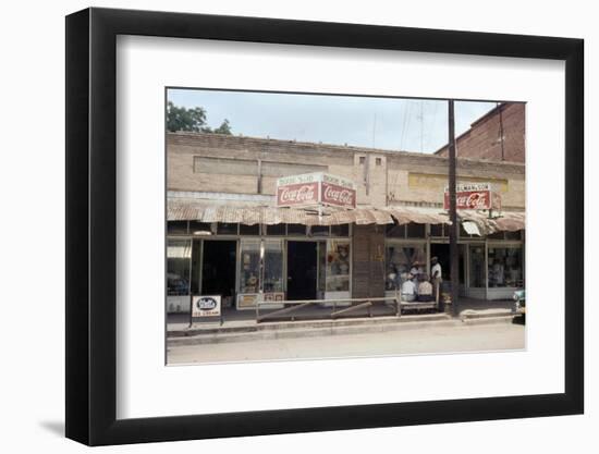 People in Front of Shops and under Metal Awning on Edisto Island, South Carolina, 1956-Walter Sanders-Framed Photographic Print