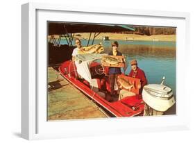 People in Motor Boat Holding Plaques with Fish-null-Framed Art Print