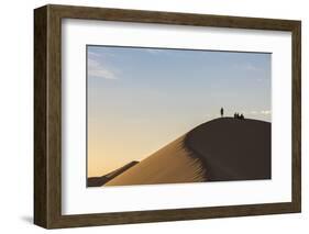 People in silhouette on Khongor sand dunes in Gobi Gurvan Saikhan National Park, Sevrei district, S-Francesco Vaninetti-Framed Photographic Print