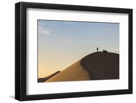 People in silhouette on Khongor sand dunes in Gobi Gurvan Saikhan National Park, Sevrei district, S-Francesco Vaninetti-Framed Photographic Print