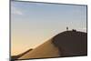 People in silhouette on Khongor sand dunes in Gobi Gurvan Saikhan National Park, Sevrei district, S-Francesco Vaninetti-Mounted Photographic Print