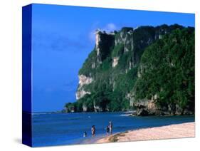 People in Water at Tumon Beach with Amantes (Two Lovers) Point Behind, Tumon, Guam-John Elk III-Stretched Canvas