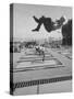 People Jumping on Trampolines-Ralph Crane-Stretched Canvas