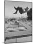 People Jumping on Trampolines-Ralph Crane-Mounted Photographic Print