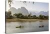People Kayaking on the Nam Song River, Vang Vieng, Laos, Indochina, Southeast Asia, Asia-Yadid Levy-Stretched Canvas