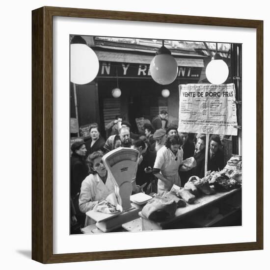 People Looking at Meat in Meat Store While Butchers Measure Out Meats-Yale Joel-Framed Photographic Print