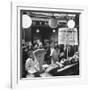 People Looking at Meat in Meat Store While Butchers Measure Out Meats-Yale Joel-Framed Photographic Print