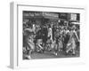 People Moving Through the Streets During Business Hours-Peter Stackpole-Framed Photographic Print