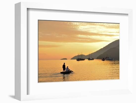 People on Dingy Paddeling Out to Ship, Cove at Vila Do Abrao, Ilha Grande, Rio De Janeiro, Brazil-Christian Heeb-Framed Photographic Print