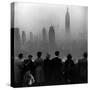 People on Top of a Building Looking Down Into Downtown Misty Smog covering Empire state Building-Eliot Elisofon-Stretched Canvas