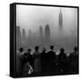 People on Top of a Building Looking Down Into Downtown Misty Smog covering Empire state Building-Eliot Elisofon-Framed Stretched Canvas