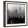 People on Top of a Building Looking Down Into Downtown Misty Smog covering Empire state Building-Eliot Elisofon-Framed Photographic Print