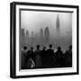 People on Top of a Building Looking Down Into Downtown Misty Smog covering Empire state Building-Eliot Elisofon-Framed Photographic Print