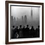 People on Top of a Building Looking Down Into Downtown Misty Smog covering Empire state Building-Eliot Elisofon-Framed Photographic Print