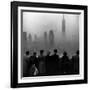 People on Top of a Building Looking Down Into Downtown Misty Smog covering Empire state Building-Eliot Elisofon-Framed Photographic Print