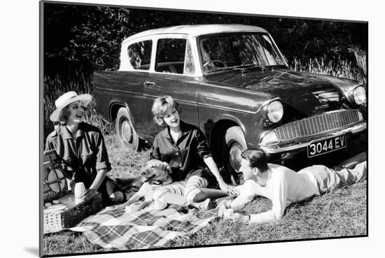 People Picnicking with their 1960 Ford Anglia Deluxe, (1960)-null-Mounted Photographic Print