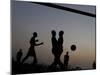 People Play Soccer at a Camp Set Up for Earthquake Survivors Left Homeless in Port-Au-Prince-null-Mounted Photographic Print