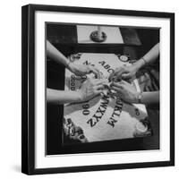 People Playing with a Ouija Board-null-Framed Photographic Print