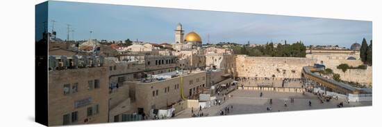 People praying at at Western Wall with Dome of the Rock and Al-Aqsa Mosque in the background, Ol...-null-Stretched Canvas