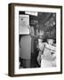 People Reading Tribune Newspaper on Train-William C^ Shrout-Framed Photographic Print