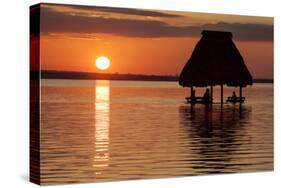 People Relaxing at Sunset, Lago Peten Itza, El Remate, Guatemala, Central America-Colin Brynn-Stretched Canvas