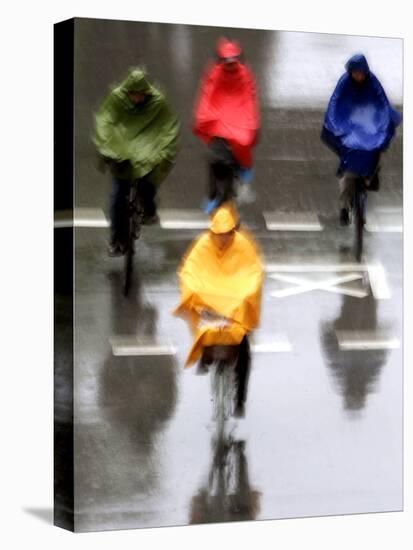 People Ride a Bicycles in the Heavy Rain-null-Stretched Canvas