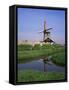 People Riding Bicycles, Zaanse Schans, Near Amsterdam, Holland-Roy Rainford-Framed Stretched Canvas